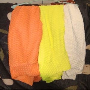 Neon yellow, orange and white workout pants